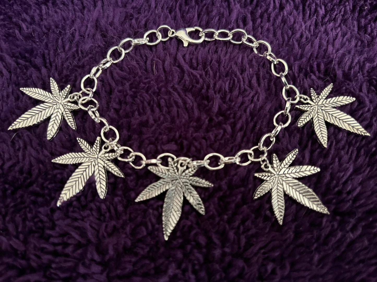 Beautiful Pot Leaf Charm Bracelet (5- 25mmX22mm charms on a 20cm adjustable bracelet)