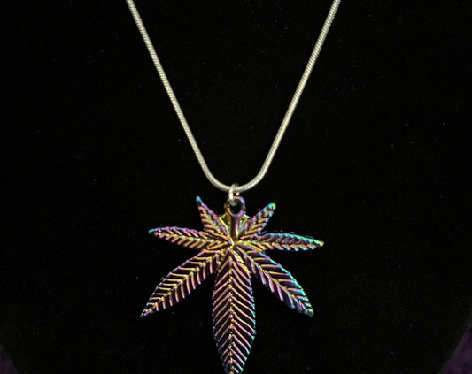 Multi colored pot leaf charm on 16” silver plated necklace